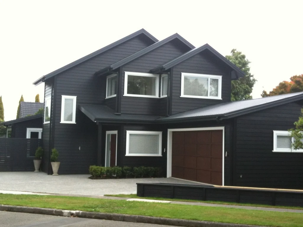 Dark-painted two-storey home exterior