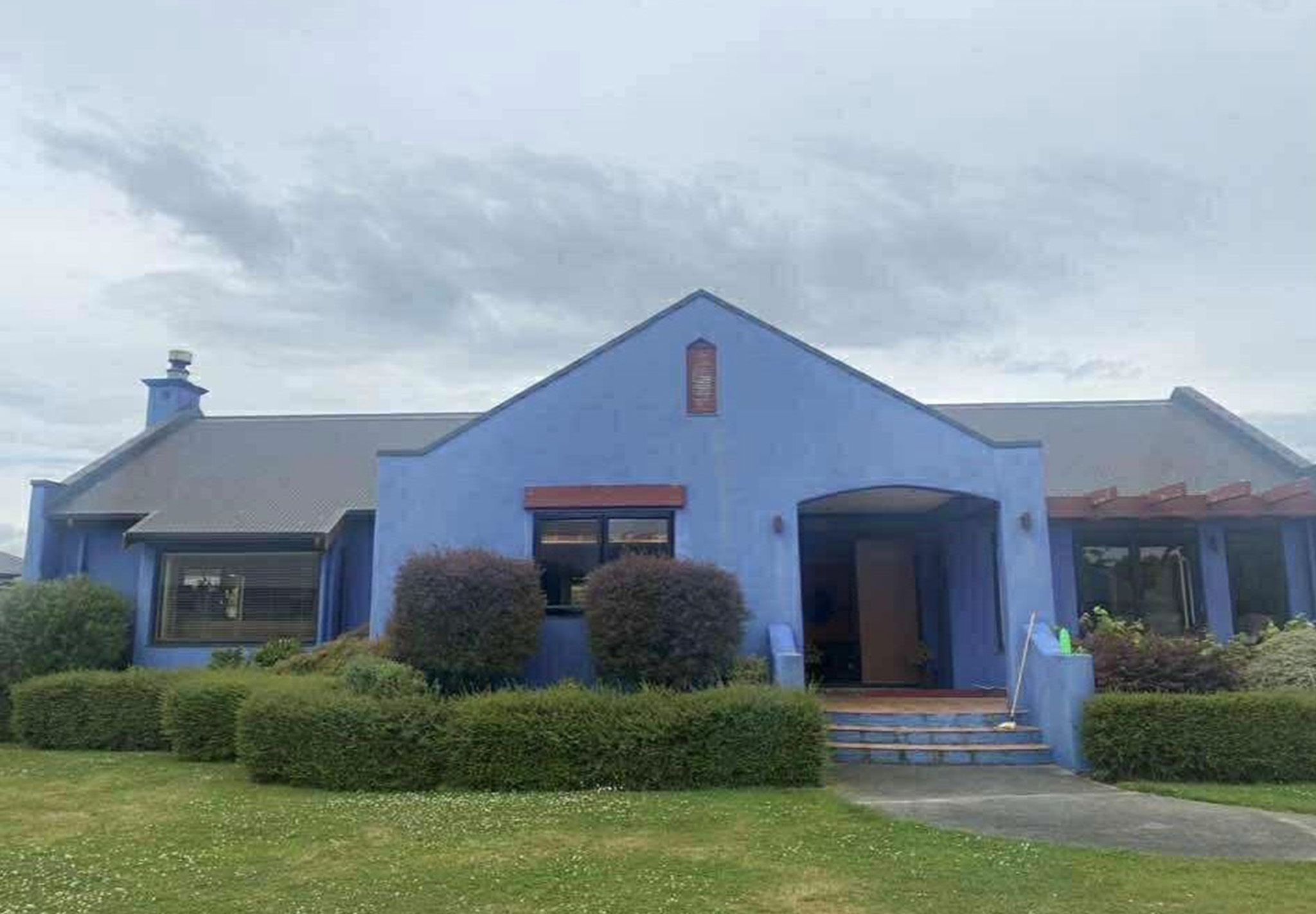 House exterior before painting - blue